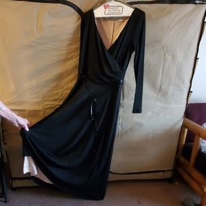 Newport News shear black formal long sleeve dress